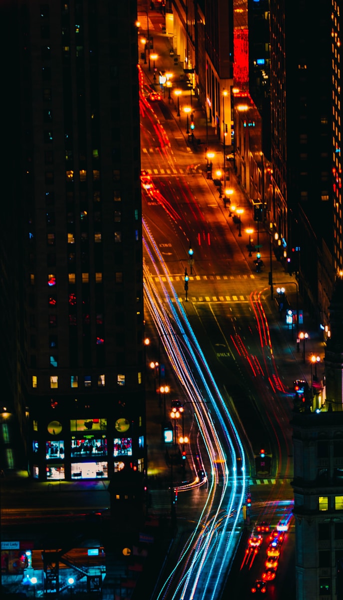 Photo by Armand De Gramont aerial view photography of vehicles at nighttime