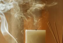 “지치지 않는 일상, 만성피로 극복 생활 루틴 주목” a couple of candles sitting on top of a table