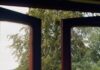 스마트폰 없이 보내는 하루, 디지털 디톡스 실천법 인기 A view through an open window of a garden with a flowering white bush